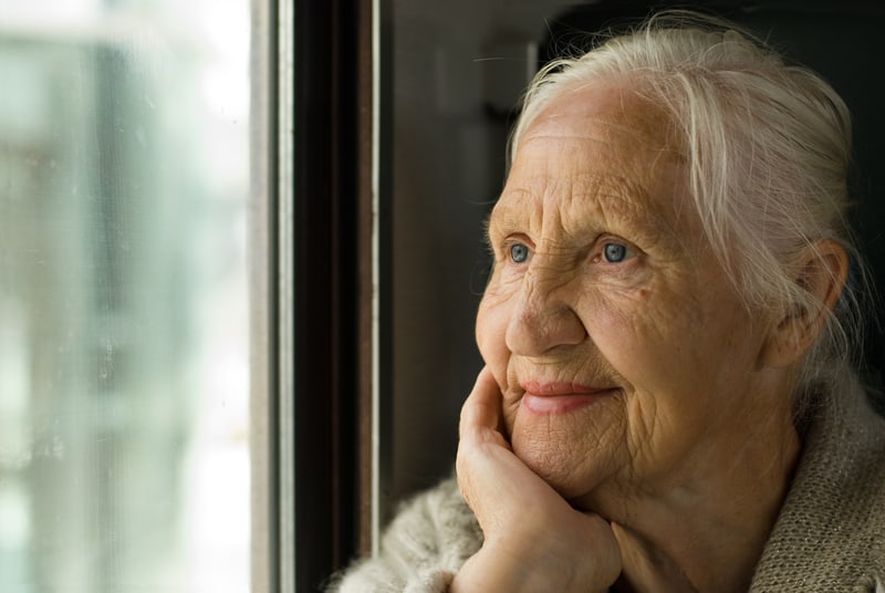 happy older woman looking out of a train window. Image by Artanika. Veteran train traveler Donna Brody looks at the benefits and basics of train travel for seniors and offers tips for travelers.